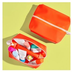 Drunk Elephant the littles orange bag